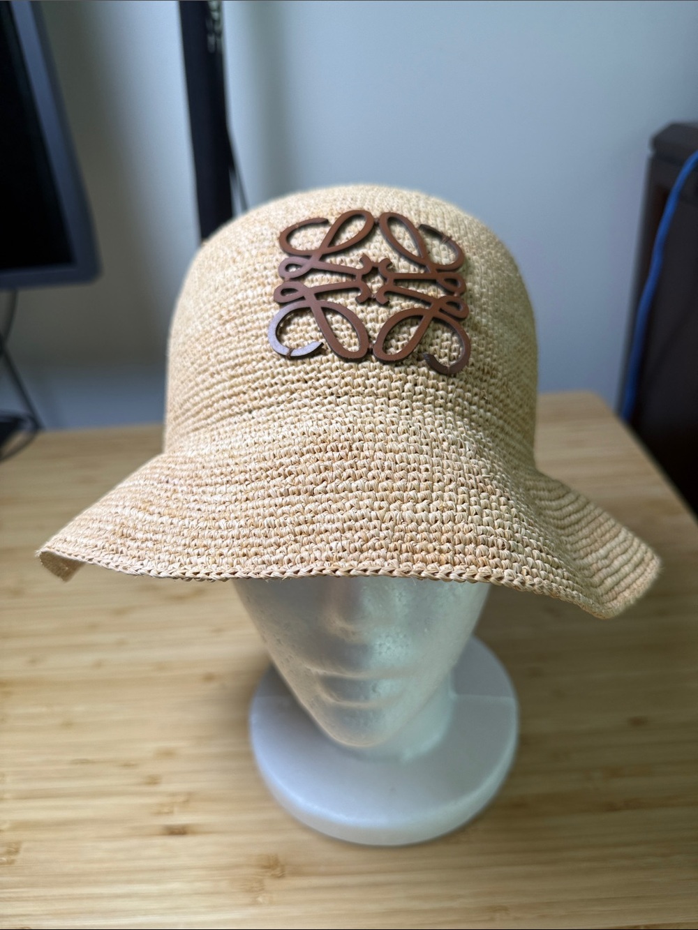Woven Straw Sun Hat with Decorative Emblem - Tan